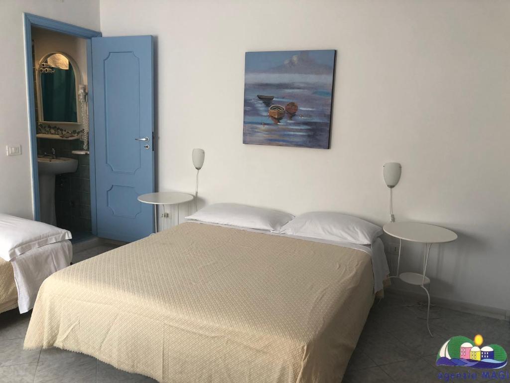Postel nebo postele na pokoji v ubytování Blu Mare
