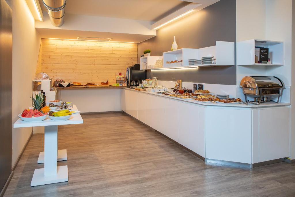 Kuchyň nebo kuchyňský kout v ubytování Hotel Villa Alberta