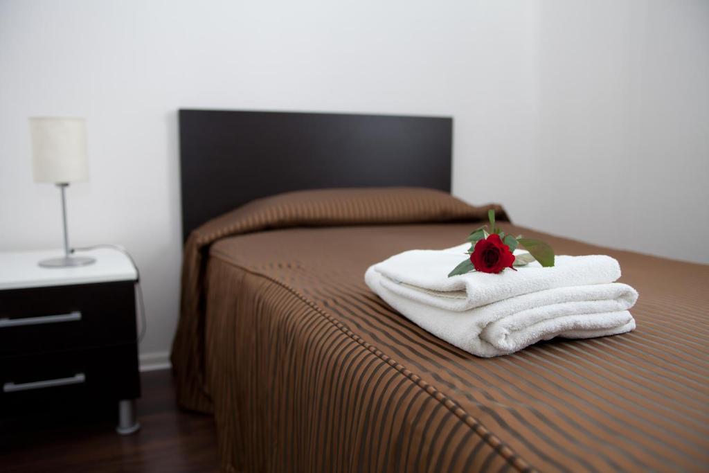 Postel nebo postele na pokoji v ubytování Levidom Residence Rooms
