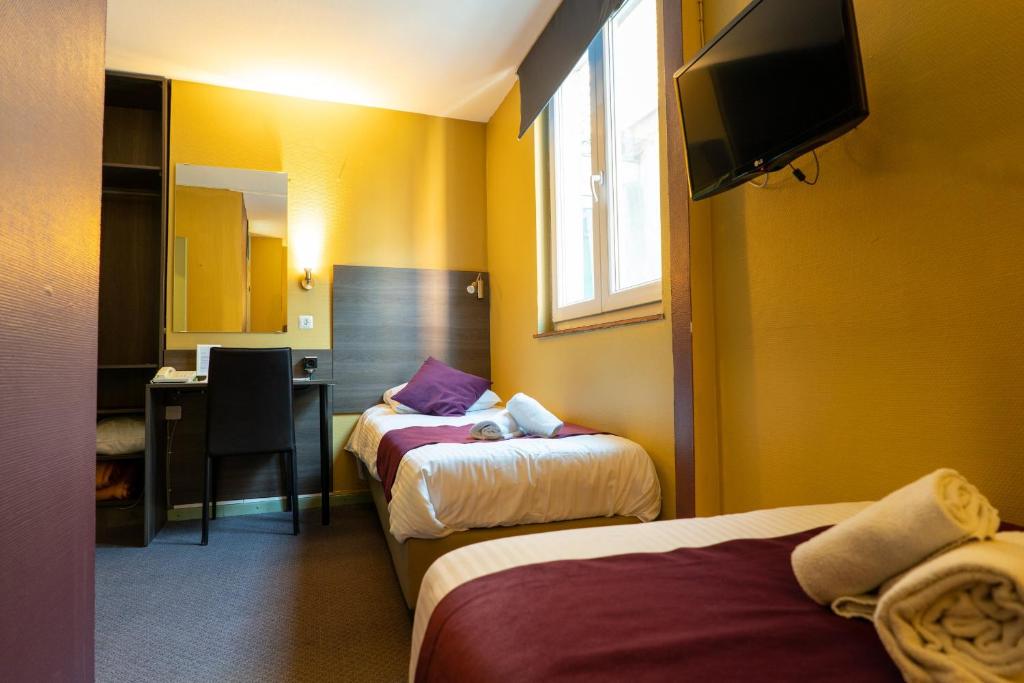 Postel nebo postele na pokoji v ubytování Flandria Hotel