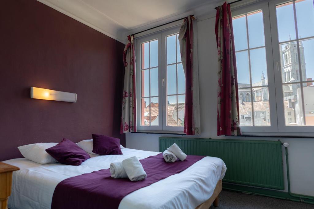 Postel nebo postele na pokoji v ubytování Flandria Hotel