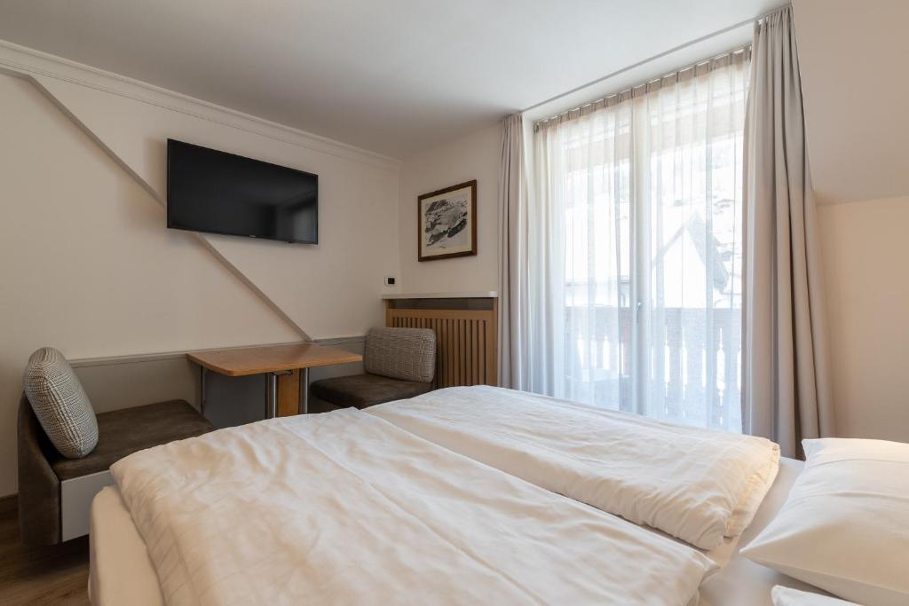 Postel nebo postele na pokoji v ubytování Villa Aurelia