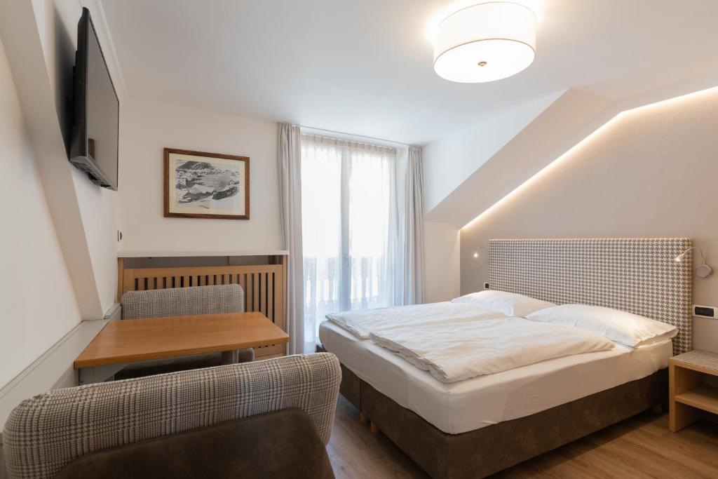 Postel nebo postele na pokoji v ubytování Villa Aurelia