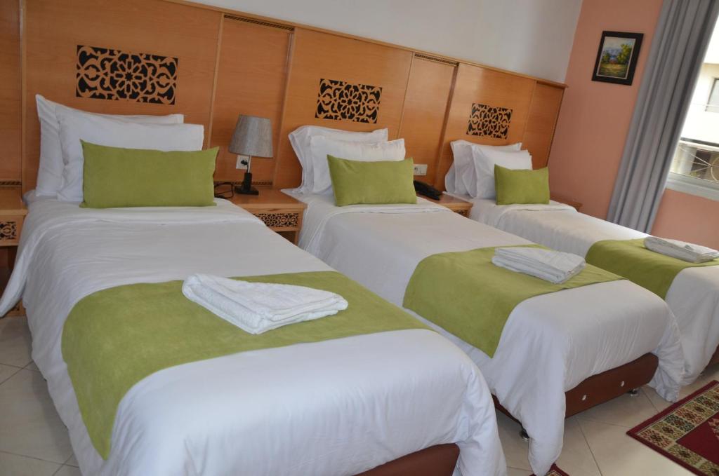 Postel nebo postele na pokoji v ubytování Hotel Miramar