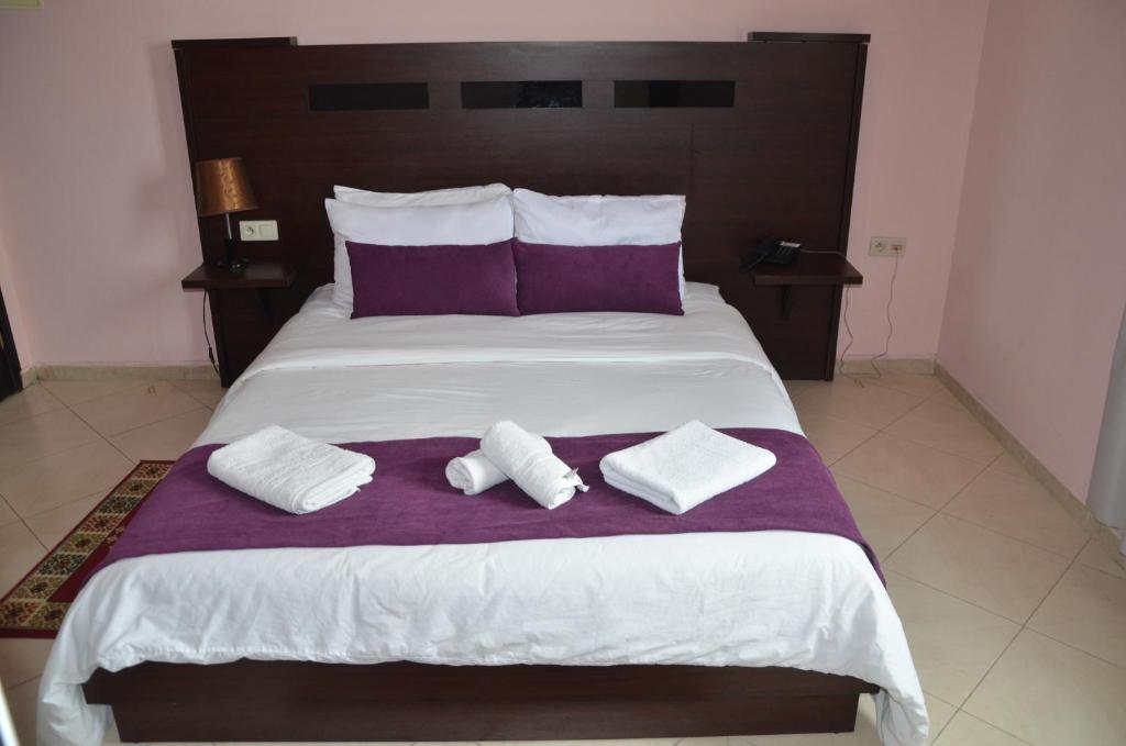 Postel nebo postele na pokoji v ubytování Hotel Miramar