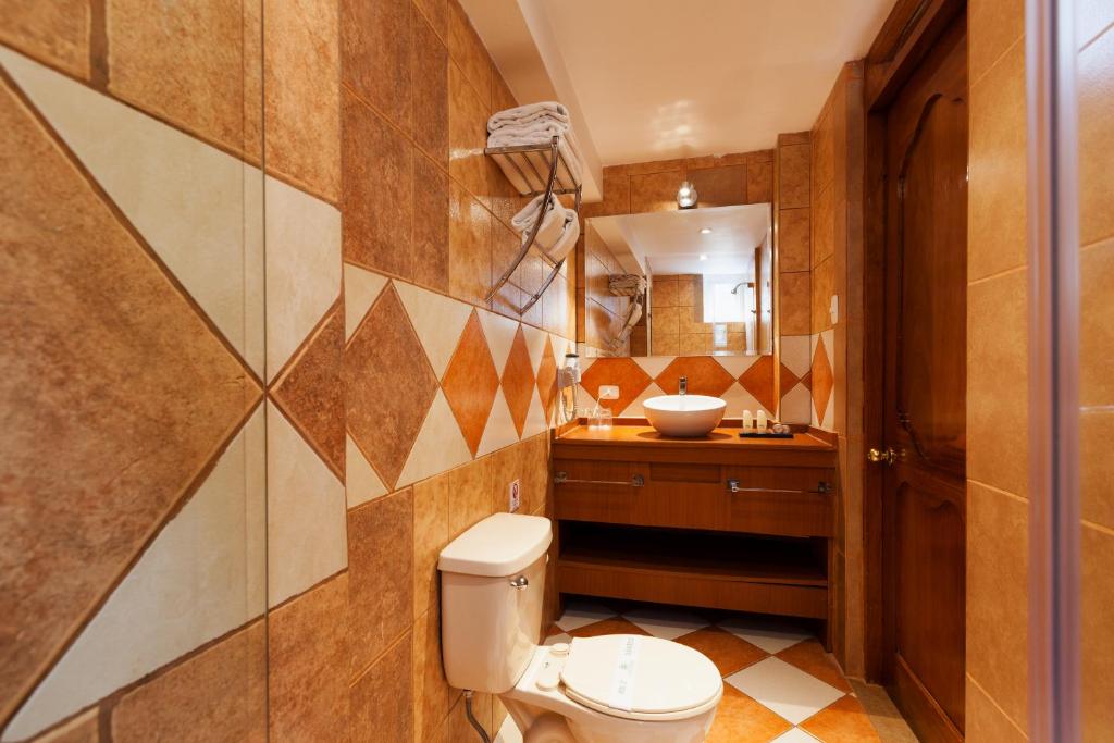 Koupelna v ubytování Inti Punku Machupicchu Hotel & Suites