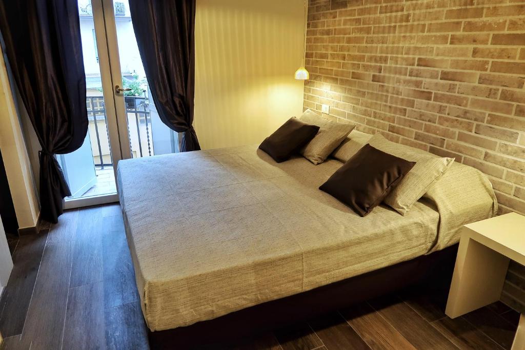 A bed or beds in a room at Maglo Station