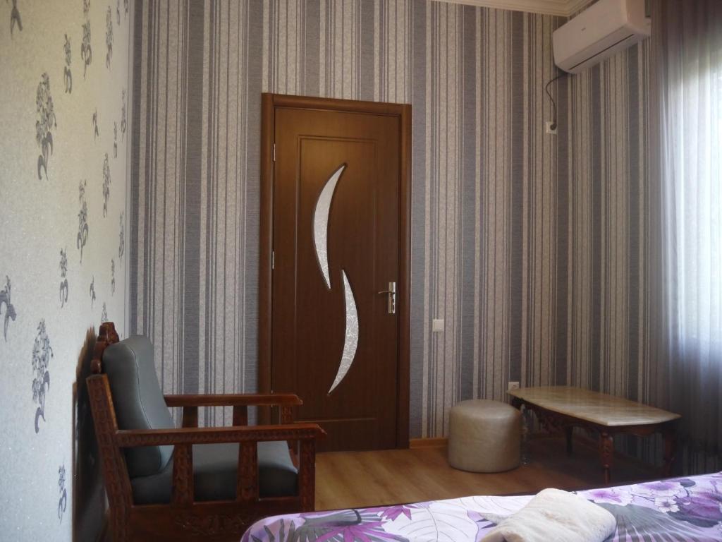 Postel nebo postele na pokoji v ubytování Guest House Ukimerioni