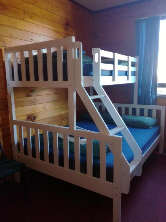 Postel nebo postele na pokoji v ubytování JunoHall Backpackers