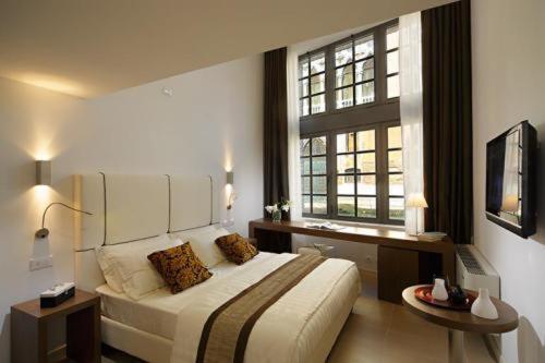 TV a/nebo společenská místnost v ubytování Al Canal Regio - Guest House