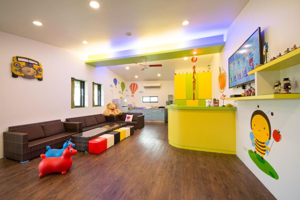 TV a/nebo společenská místnost v ubytování Little Apple B&B
