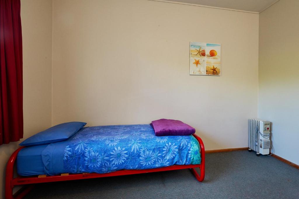 Postel nebo postele na pokoji v ubytování Dolphin Lodge