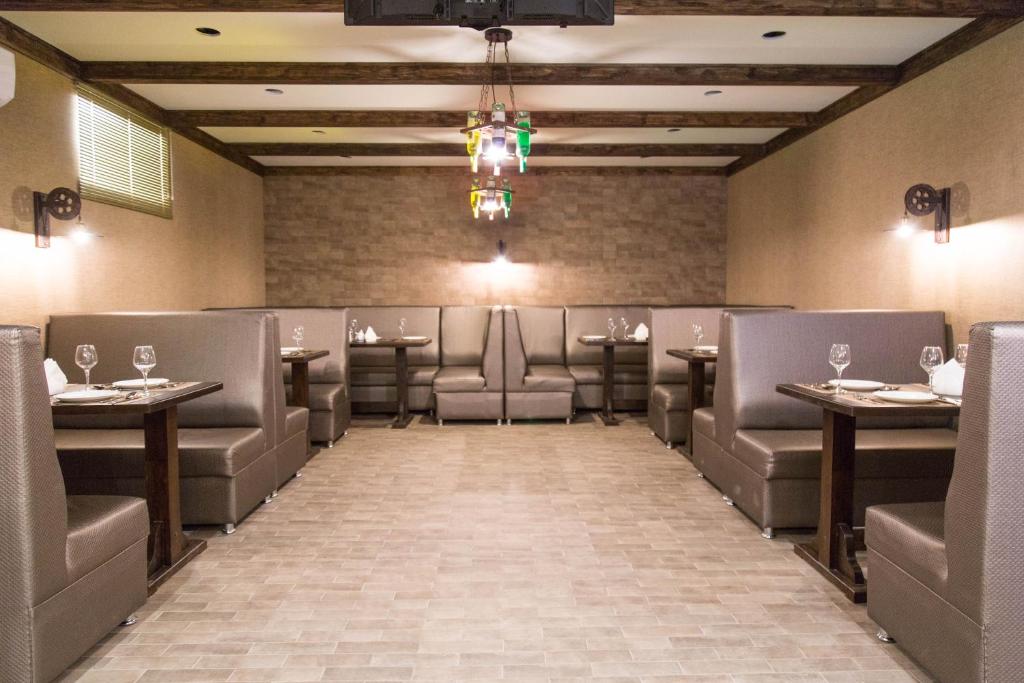 Posezení v ubytování De'Mar Hotel