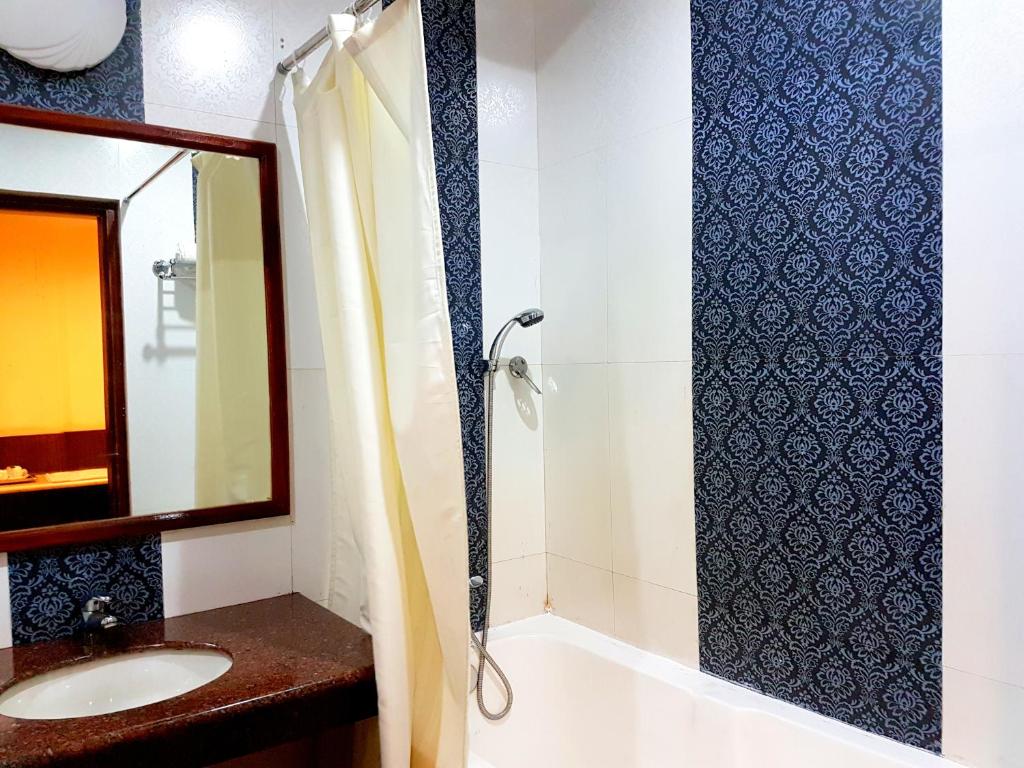 Koupelna v ubytování Hotel Sidharth