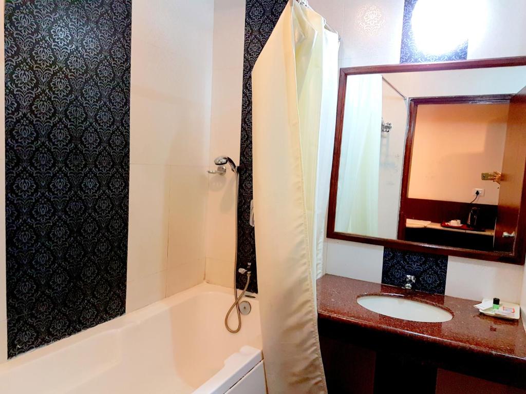 Koupelna v ubytování Hotel Sidharth