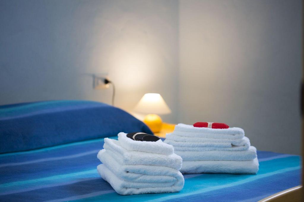 Postel nebo postele na pokoji v ubytování B&B La Baita Del Sud