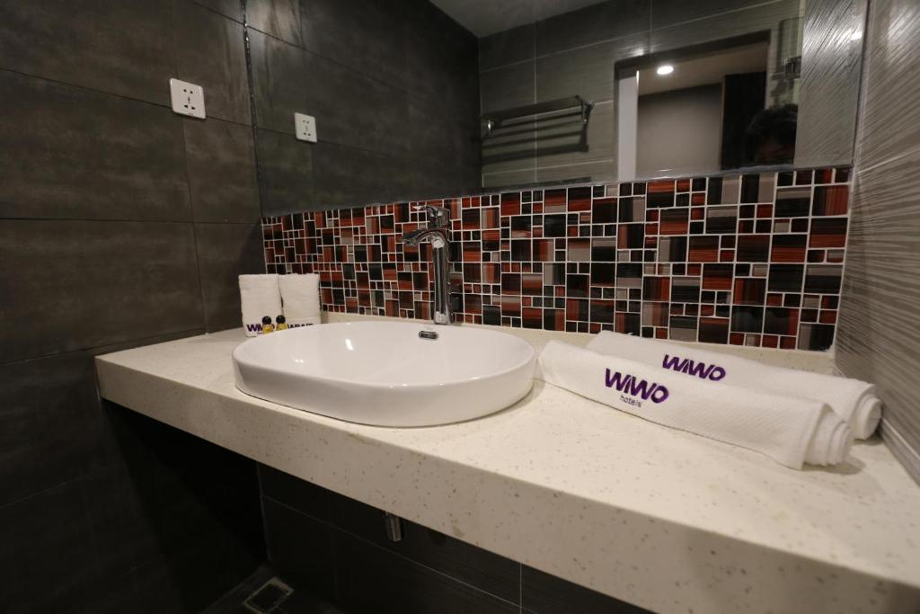 Koupelna v ubytování WIWO Hotel