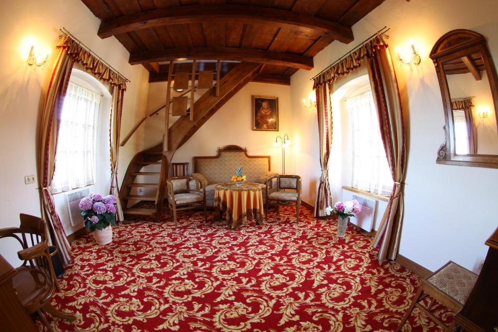 Posezení v ubytování Hotel Fortna