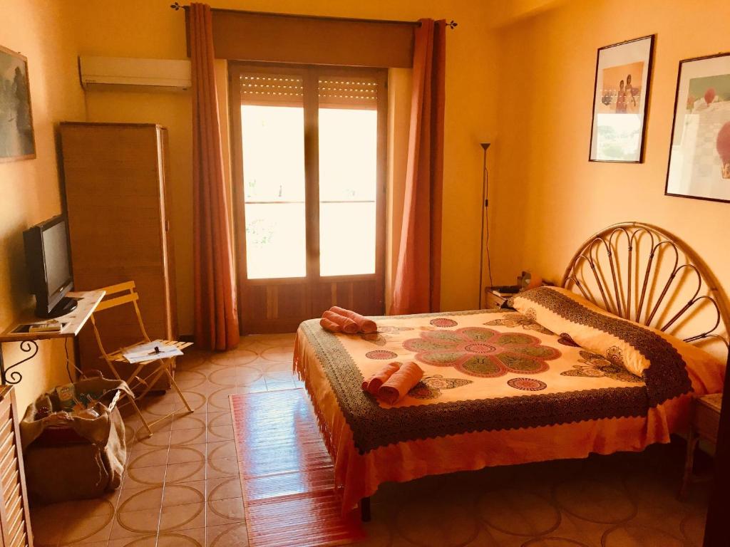 Televízia a/alebo spoločenská miestnosť v ubytovaní La Terrazza Sul Mar Mediterraneo