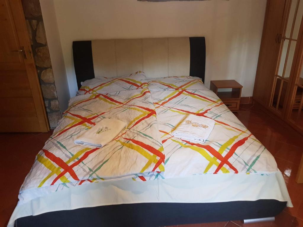 Postel nebo postele na pokoji v ubytování Cserhát Guesthouse