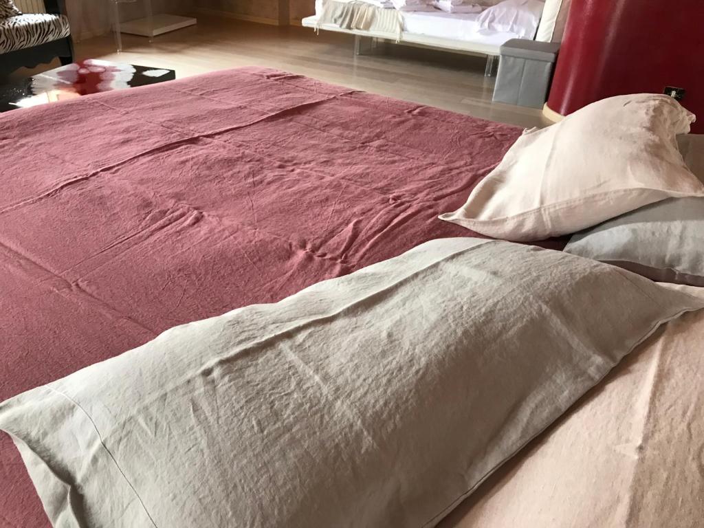 Postel nebo postele na pokoji v ubytování Albergo Al Cacciatore Tortellinando