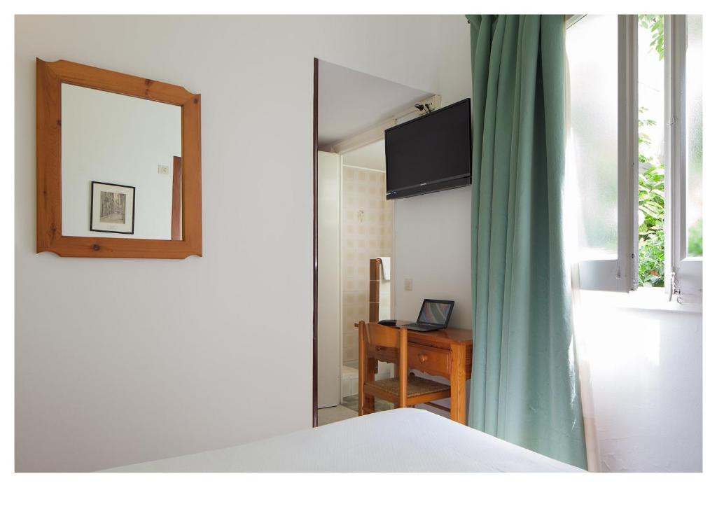 TV a/nebo společenská místnost v ubytování Hotel Ninays