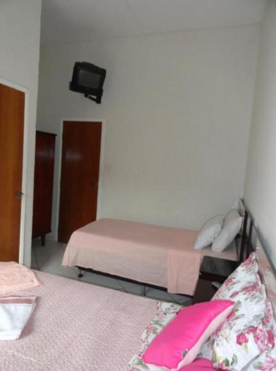 Postel nebo postele na pokoji v ubytování Hotel Royal Class