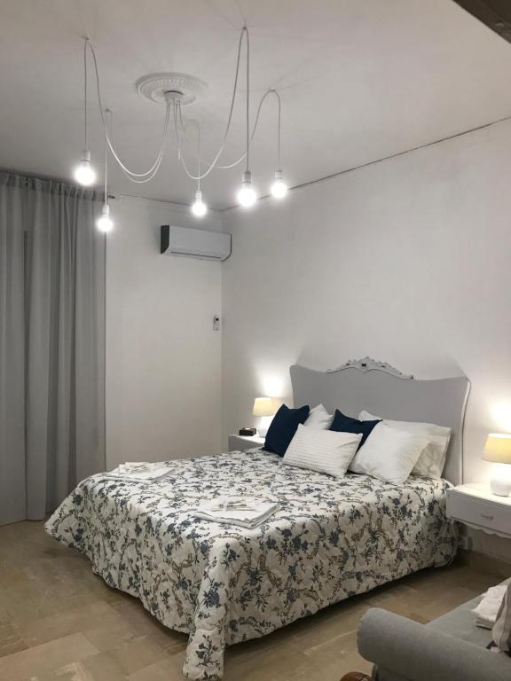 Postel nebo postele na pokoji v ubytování Cappuccini Green Relax