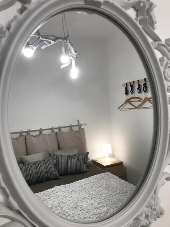 Postel nebo postele na pokoji v ubytování Cappuccini Green Relax