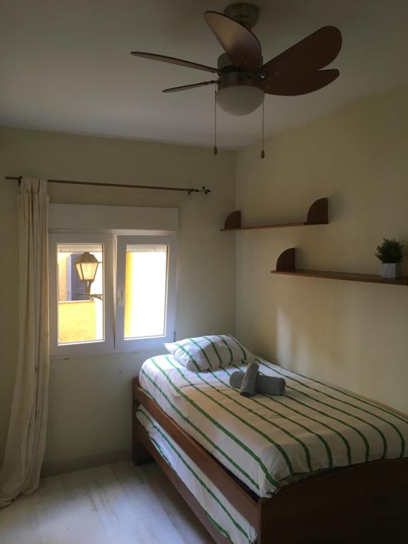 Posteľ alebo postele v izbe v ubytovaní Tarifa Beach apartment with ocean views and pool