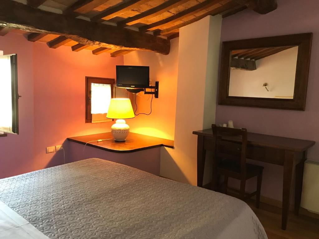 Postel nebo postele na pokoji v ubytování Residenza Via Dante