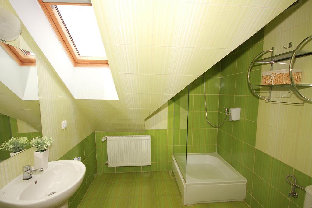 Kúpeľňa v ubytovaní Apartamenty Olsztyn