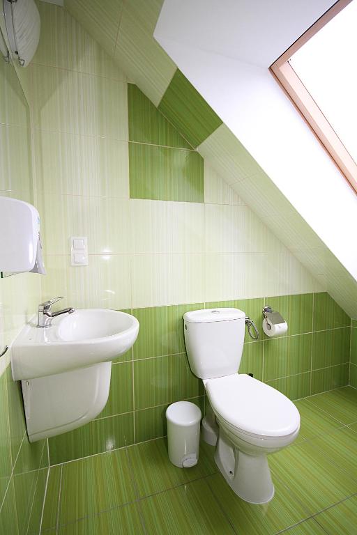 Kúpeľňa v ubytovaní Apartamenty Olsztyn