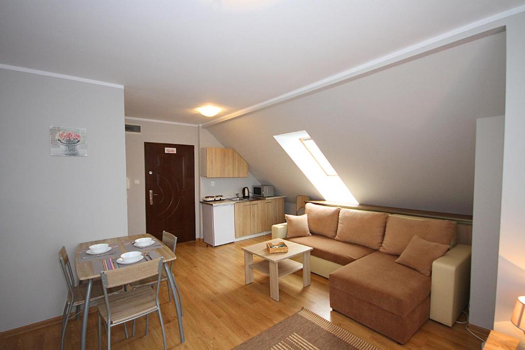 Posedenie v ubytovaní Apartamenty Olsztyn