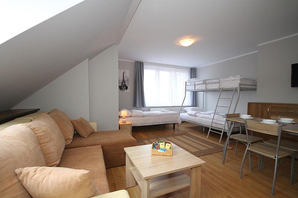 Posedenie v ubytovaní Apartamenty Olsztyn