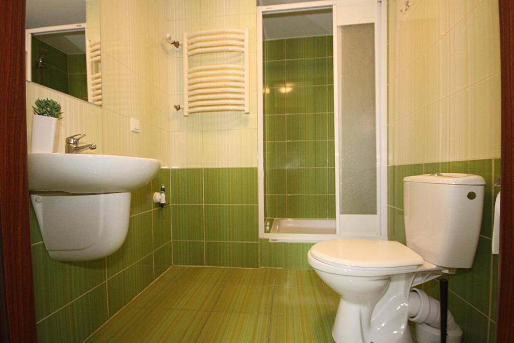 Kúpeľňa v ubytovaní Apartamenty Olsztyn