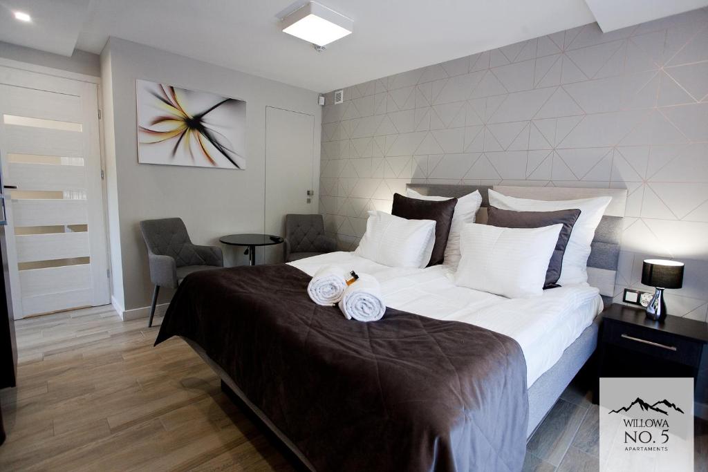 Posteľ alebo postele v izbe v ubytovaní Willowa NO. 5 APARTAMENTS
