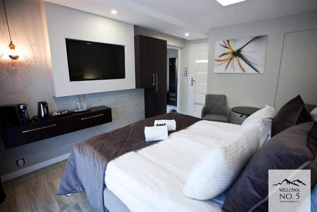 Posteľ alebo postele v izbe v ubytovaní Willowa NO. 5 APARTAMENTS