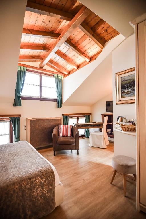 Postel nebo postele na pokoji v ubytování Venica & Venica Wine Resort