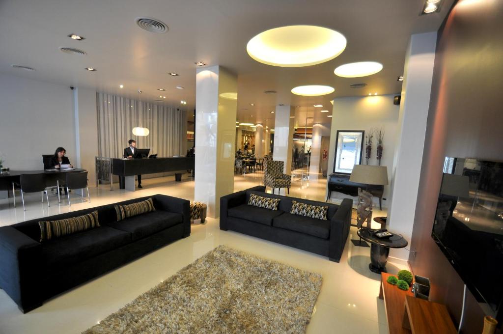 Posezení v ubytování Hotel Bicentenario Suites & Spa