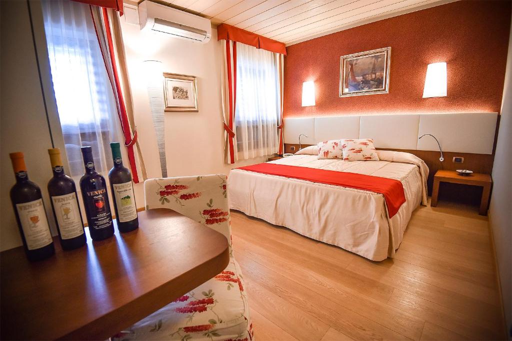 Postel nebo postele na pokoji v ubytování Venica & Venica Wine Resort