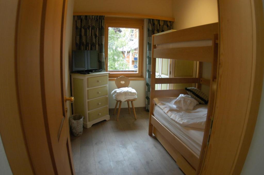 Postel nebo postele na pokoji v ubytování Chalet Guggenbiel