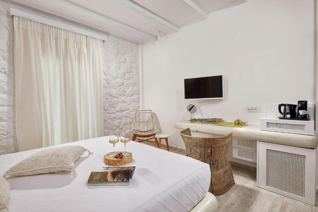 Postel nebo postele na pokoji v ubytování Petri Suites