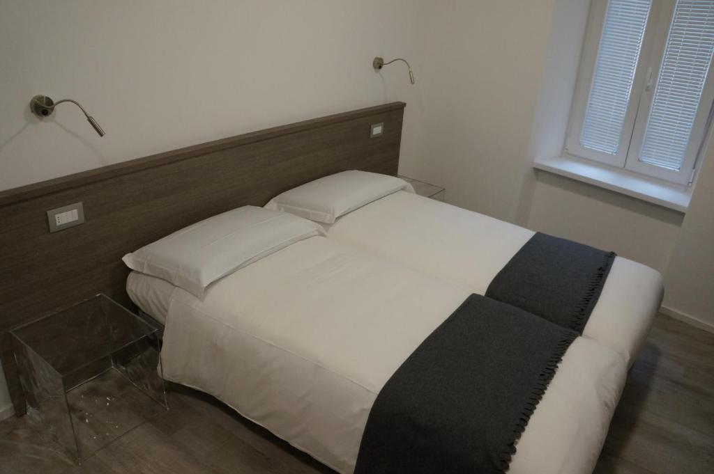 Posteľ alebo postele v izbe v ubytovaní Casa vacanze da Alcide