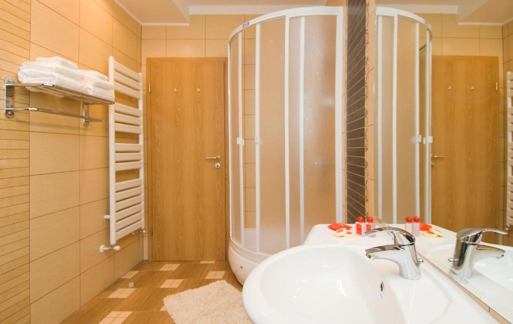 Postel nebo postele na pokoji v ubytování Hotel Ambient