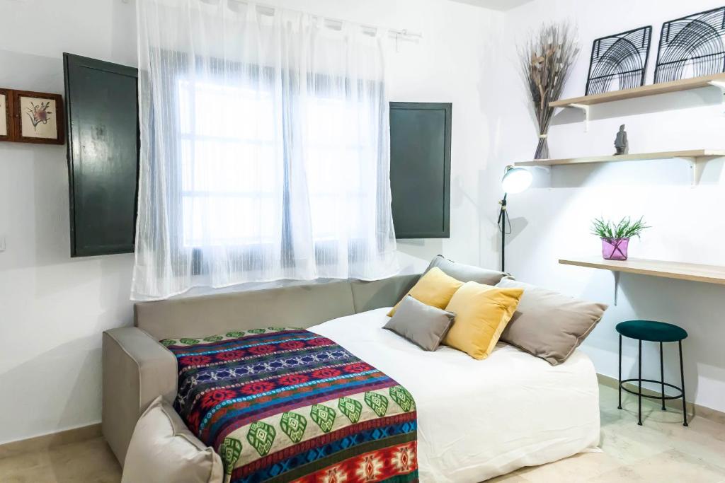 Postel nebo postele na pokoji v ubytování San Eloy Dream Apartment by Valcambre