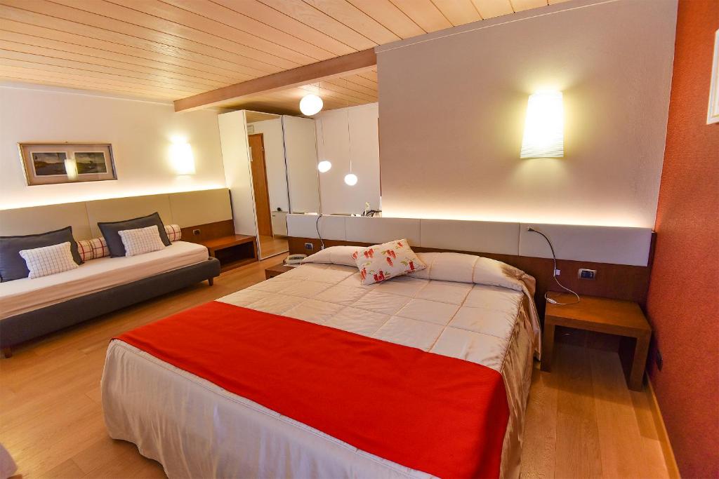 Postel nebo postele na pokoji v ubytování Venica & Venica Wine Resort