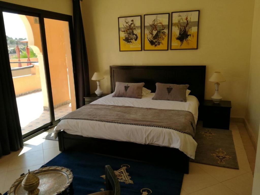 Postel nebo postele na pokoji v ubytování Riad Asmaa Agadir