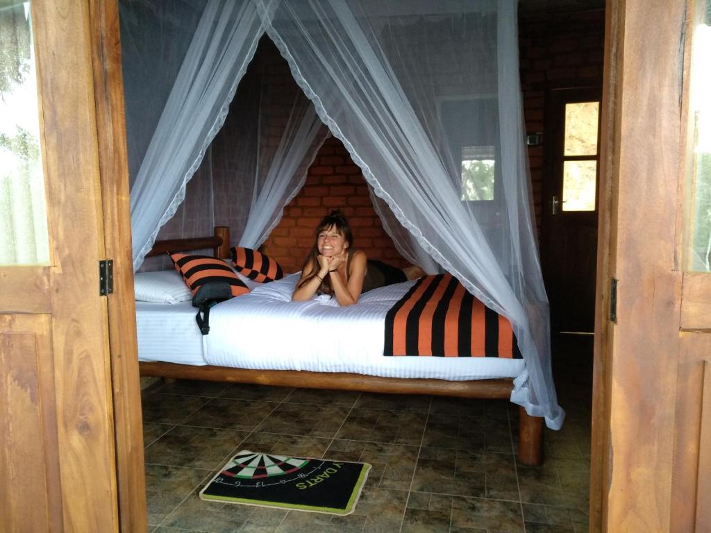 Postel nebo postele na pokoji v ubytování Apurvi Homestay