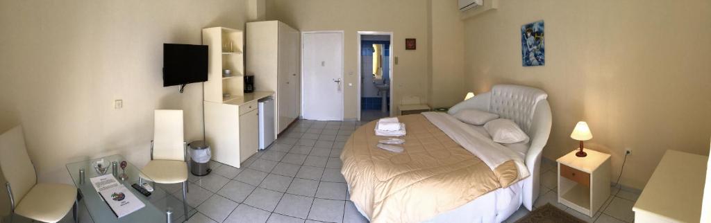 Voodi või voodid majutusasutuse Hotel Oasis toas